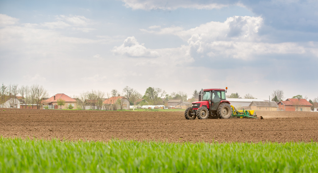 An image of a tractor at planting season