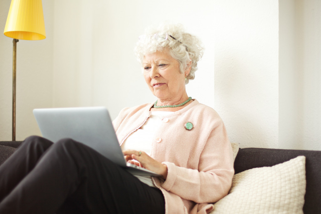 elder woman using computer