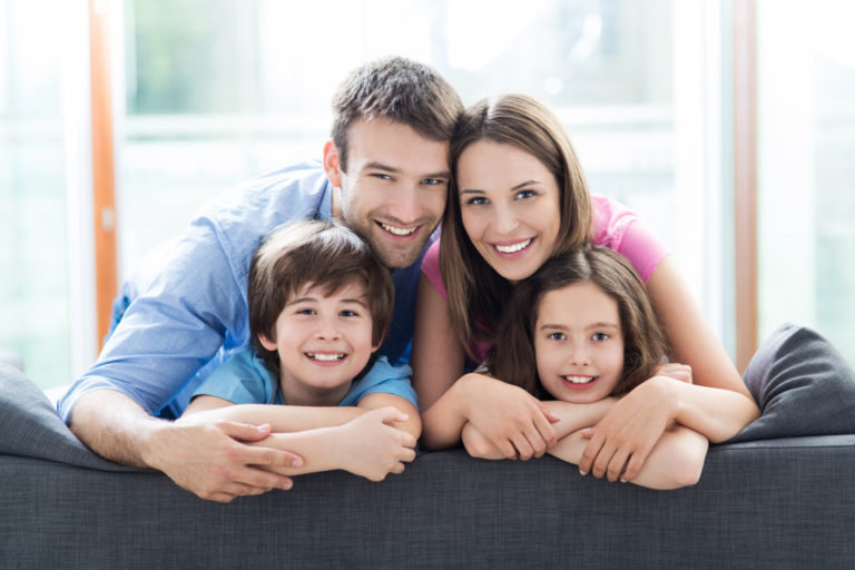 family taking picture together despite of divorce