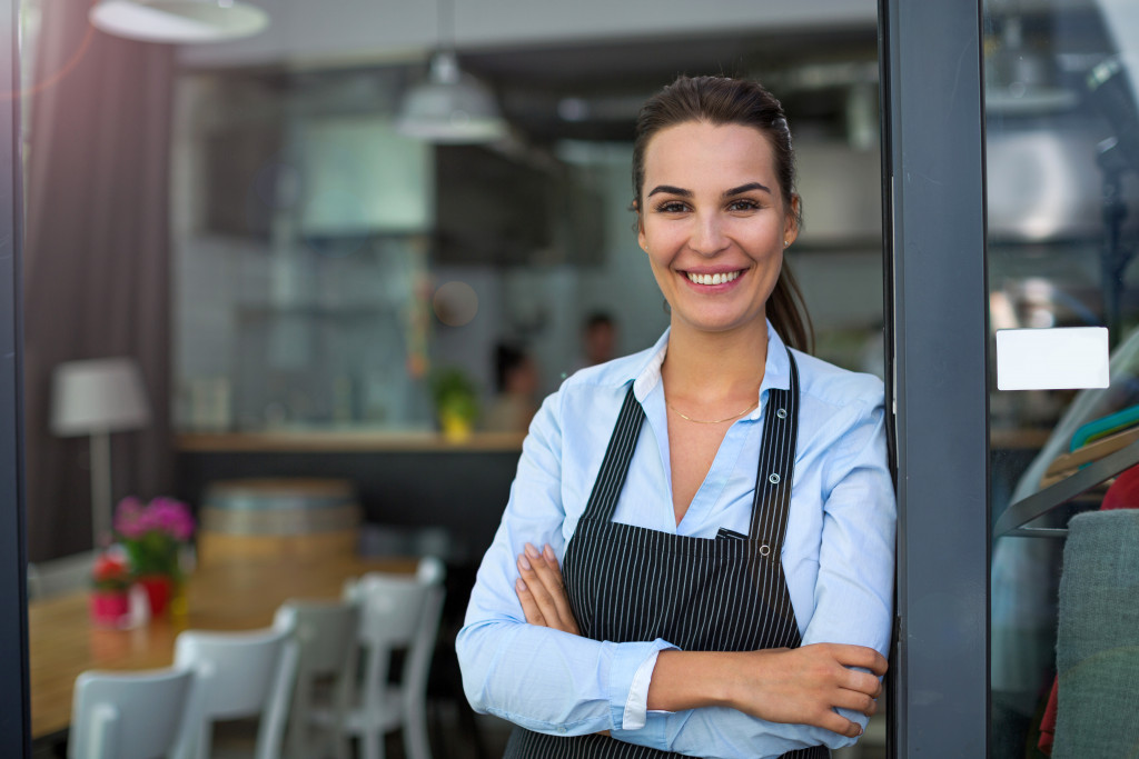 waitress standing in doorway