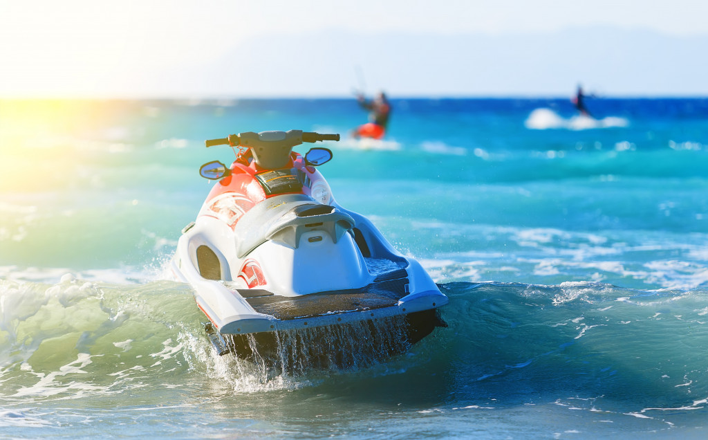 a white and red jetski in the light