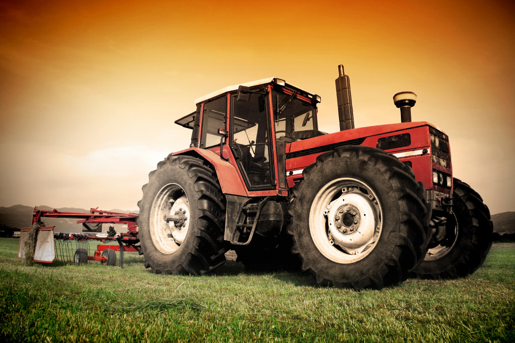 An image of a tractor on a field