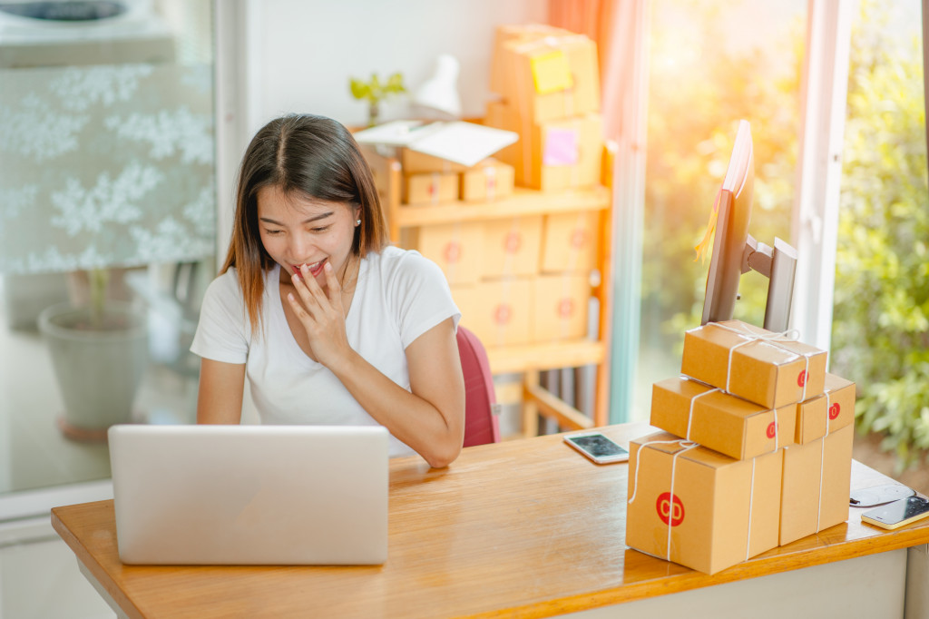 woman preparing to ship out her products