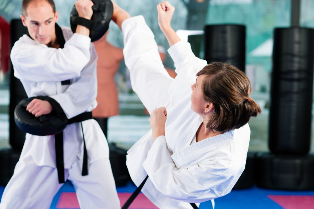 woman learning karate