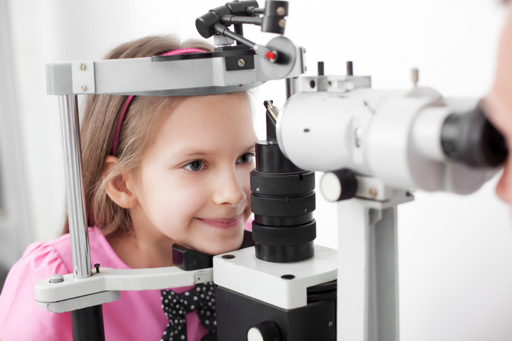 a young girl for eye health check