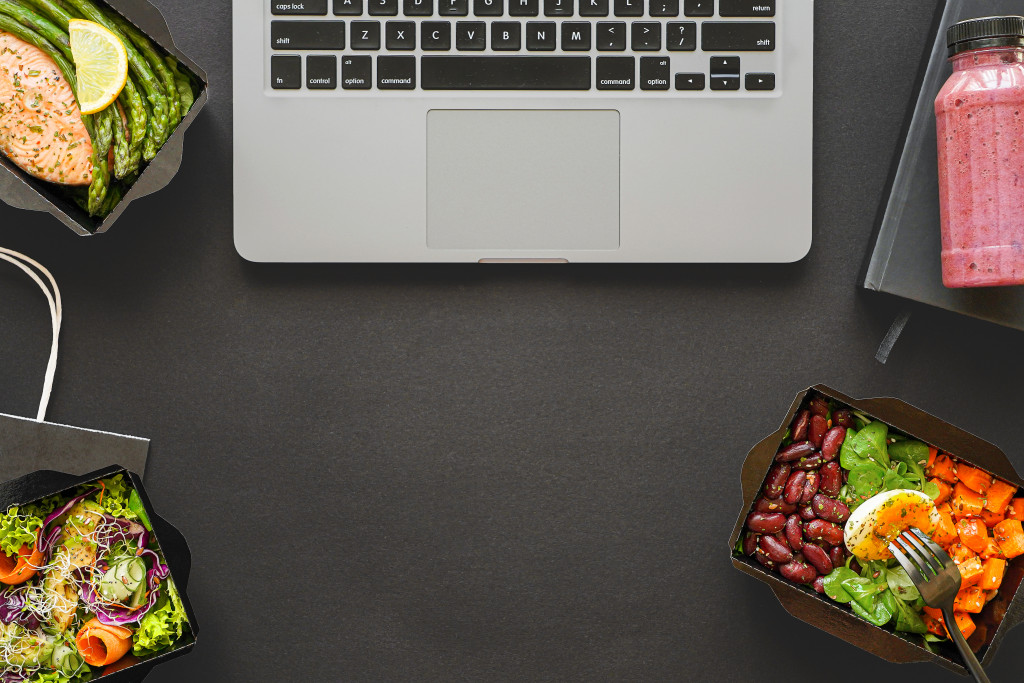 laptop with food around