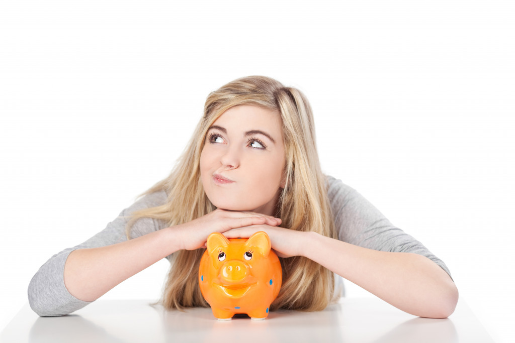 a person with a piggybank