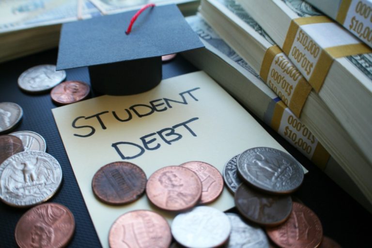 graduation cap and coins