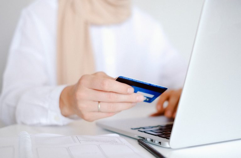 person using their credit card online