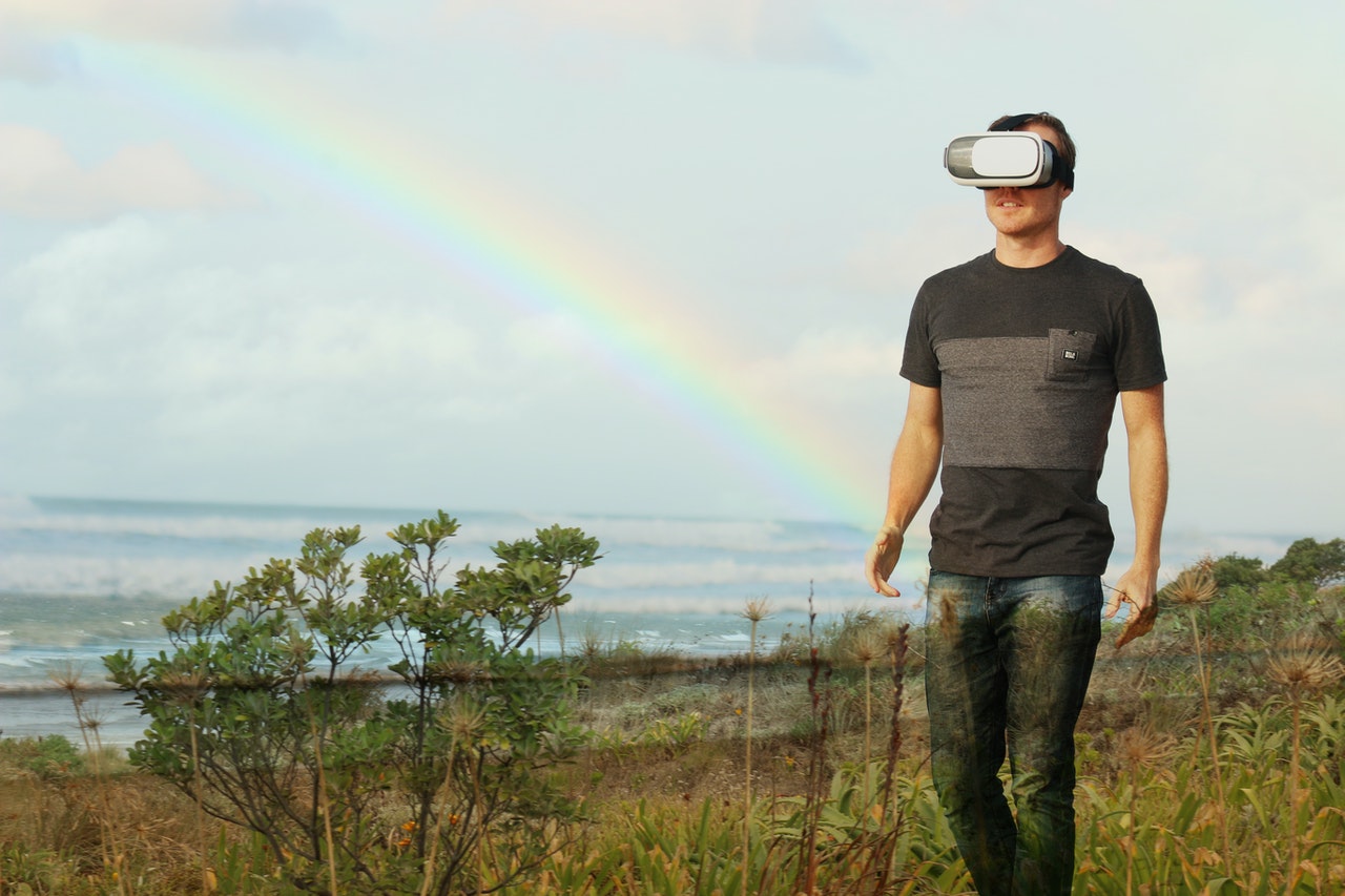 man using VR goggles outdoor