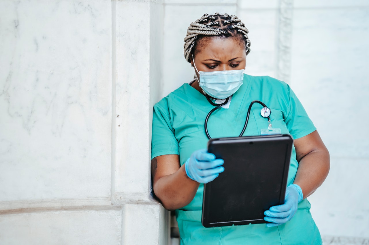 medical doctor looking at the board