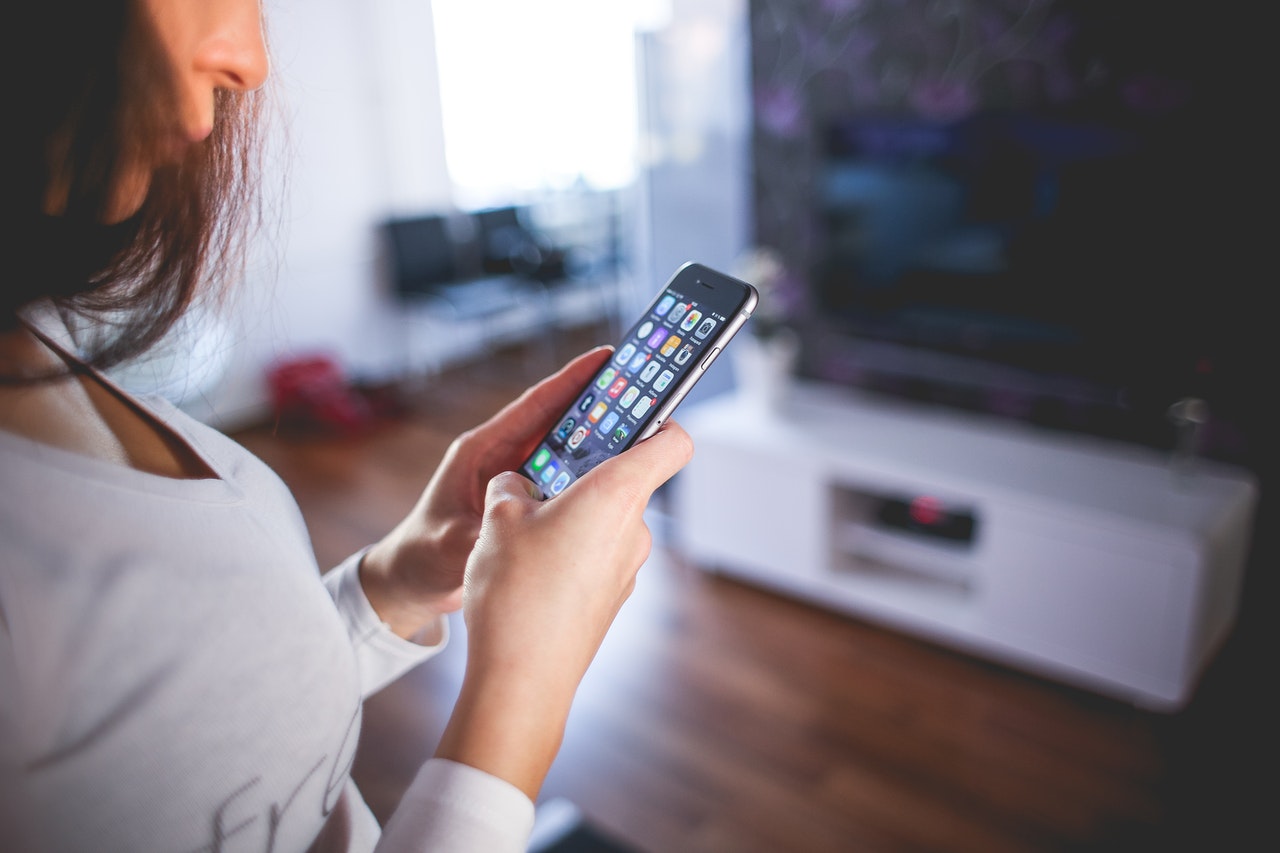 woman using her phone