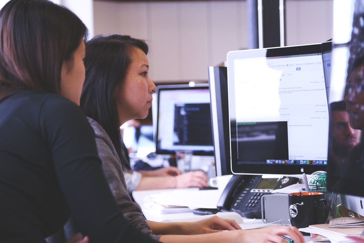 women looking at a computer